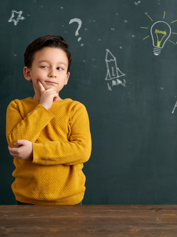Boy and black board